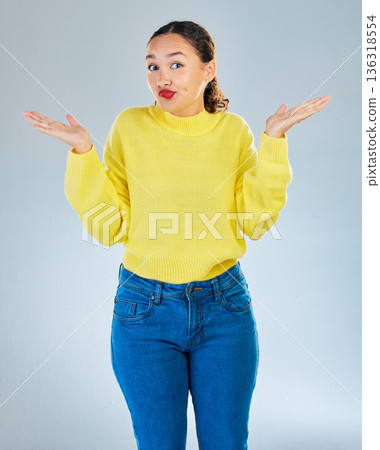 Portrait, confused woman and shrug in studio, white background or question of choice, emoji or puzzled reaction. Female model, body language and dont know why in doubt, uncertainty or forgot decision Portrait, confused woman and shrug in studio, white background or question of choice, emoji or puzzled reaction. Female model, body language and dont know why in doubt, uncertainty or forgot decision 136318554