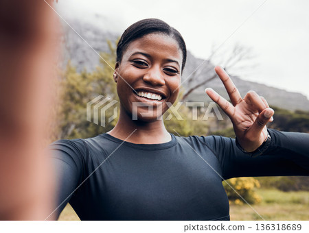 Fitness, black woman and taking selfie in forest for workout with peace sign. Training or exercise, health wellness or motivation and happy female athlete with hand emoji for social media in woods 136318689