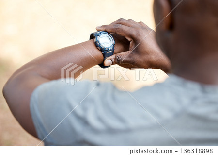 Man, check smart watch and fitness in park to monitor speed, heart or vital signs. Outdoor, male runner and iot clock for time, training stats or exercise with stopwatch, nature or summer for health Man, check smart watch and fitness in park to monitor speed, heart or vital signs. Outdoor, male runner and iot clock for time, training stats or exercise with stopwatch, nature or summer for health 136318898