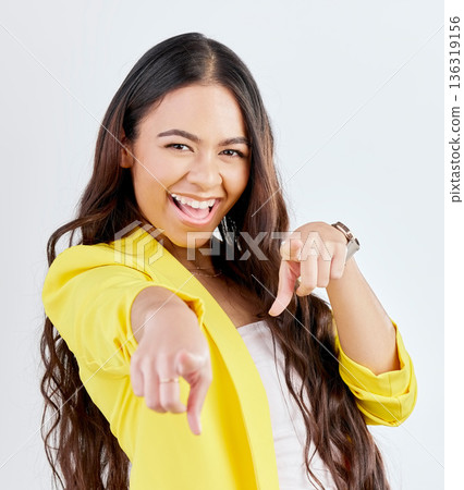 Portrait, pointing and choice with an excited woman in studio on a gray background to select you. Smile, hands and decision with a happy young female model in yellow clothes to vote on an option Portrait, pointing and choice with an excited woman in studio on a gray background to select you. Smile, hands and decision with a happy young female model in yellow clothes to vote on an option 136319156