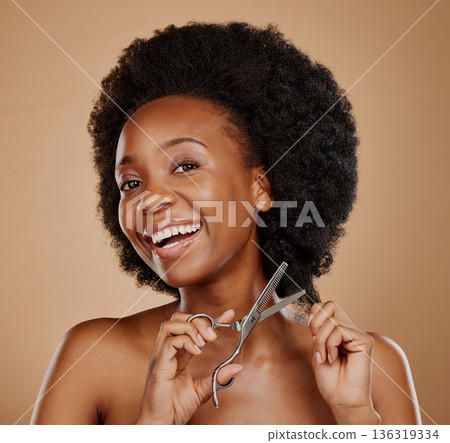Portrait, happy and black woman cutting hair as hairdresser, damage or maintenance for afro style. Smile, salon and an African girl or model with scissors for hairstyle isolated on studio background 136319334