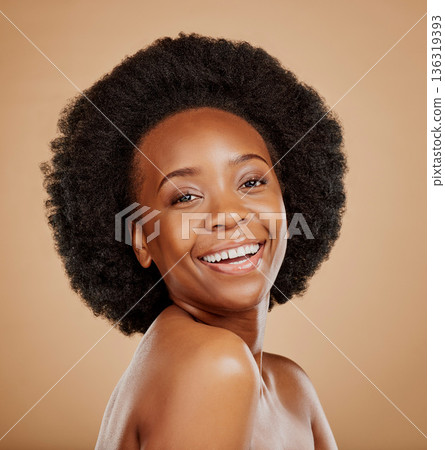Happy, skincare and portrait of a black woman with a glow from dermatology, salon or wellness. Smile, beauty and face of an African model with care for skin isolated on a brown background in a studio Happy, skincare and portrait of a black woman with a glow from dermatology, salon or wellness. Smile, beauty and face of an African model with care for skin isolated on a brown background in a studio 136319393