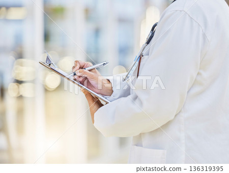 Hands, person or doctor writing on clipboard, documents or administration of healthcare schedule. Closeup of medical worker, pen or report of insurance checklist, contract or paper script in hospital Hands, person or doctor writing on clipboard, documents or administration of healthcare schedule. Closeup of medical worker, pen or report of insurance checklist, contract or paper script in hospital 136319395