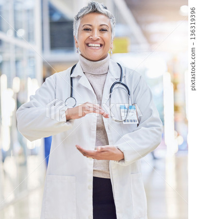 Hospital, doctor and portrait of woman with hand shape for wellness, medical service and insurance in clinic. Healthcare, cardiology and happy female health worker with gesture for innovation mockup Hospital, doctor and portrait of woman with hand shape for wellness, medical service and insurance in clinic. Healthcare, cardiology and happy female health worker with gesture for innovation mockup 136319396