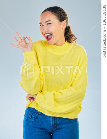 Okay, excited portrait and woman in studio, white background and vote of good review. Happy female model show ok hands for success, agreement or icon for perfect, yes emoji or satisfaction of winning 136319539
