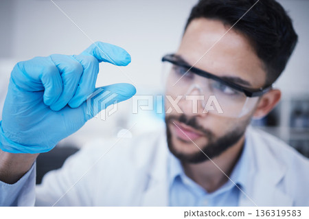 Laboratory, man or hand of scientist with small size for research, assessment or experiment innovation. Healthcare, science blur or biologist with little scale gesture for future development results Laboratory, man or hand of scientist with small size for research, assessment or experiment innovation. Healthcare, science blur or biologist with little scale gesture for future development results 136319583
