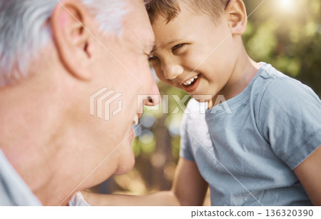 Children, camp and a grandpa hiking with his grandson outdoor in nature for bonding, travel or adventure together. Kids, face or funny and a little boy laughing with his grandfather on the woods Children, camp and a grandpa hiking with his grandson outdoor in nature for bonding, travel or adventure together. Kids, face or funny and a little boy laughing with his grandfather on the woods 136320390