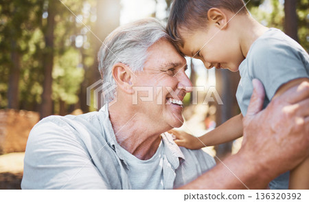Family, hiking or camping with a boy and grandfather bonding outdoor in nature together while on an adventure. Spring, travel and face of a senior man with his grandson closeup in the forest or woods Family, hiking or camping with a boy and grandfather bonding outdoor in nature together while on an adventure. Spring, travel and face of a senior man with his grandson closeup in the forest or woods 136320392