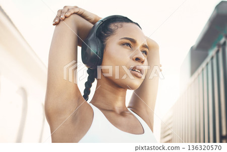 Stretching, city and woman with headphones, training and stress relief with exercise, audio and radio. Female person, athlete or girl with headset, streaming music and wellness with fitness and relax Stretching, city and woman with headphones, training and stress relief with exercise, audio and radio. Female person, athlete or girl with headset, streaming music and wellness with fitness and relax 136320570