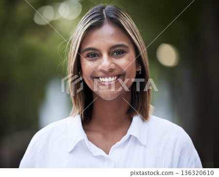 Portrait, smile and confident with a woman in nature, outdoor on a green background for travel or freedom. Face, happy and a carefree young female person standing in a park for fresh air or adventure Portrait, smile and confident with a woman in nature, outdoor on a green background for travel or freedom. Face, happy and a carefree young female person standing in a park for fresh air or adventure 136320610