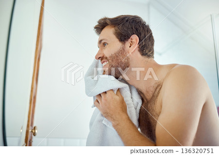 Man, cleaning face and towel in mirror with smile, self care and hygiene to start morning in home bathroom. Young guy, person and cloth for beauty, facial cosmetics and wellness for beard in house Man, cleaning face and towel in mirror with smile, self care and hygiene to start morning in home bathroom. Young guy, person and cloth for beauty, facial cosmetics and wellness for beard in house 136320751