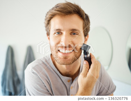 Portrait, man and shave beard with razor for hair removal, aesthetic skincare and facial beauty cleaning in morning at home. Happy guy shaving face with blade, trimmer and cosmetic tools in bathroom 136320776