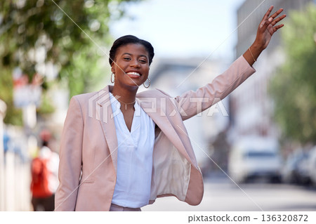 Happy black woman, taxi and travel in city waving or waiting for transportation on street sidewalk. African female person calling vehicle or signal with hand for ride service in road of an urban town Happy black woman, taxi and travel in city waving or waiting for transportation on street sidewalk. African female person calling vehicle or signal with hand for ride service in road of an urban town 136320872