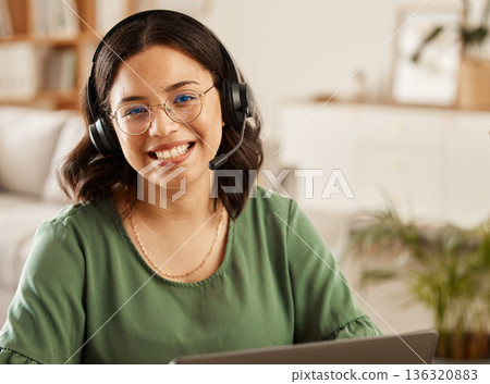 Remote work, portrait and woman for online meeting at home with laptop and online job. Headphones, female person and computer in a house with a smile from digital web blogger at desk in living room Remote work, portrait and woman for online meeting at home with laptop and online job. Headphones, female person and computer in a house with a smile from digital web blogger at desk in living room 136320883