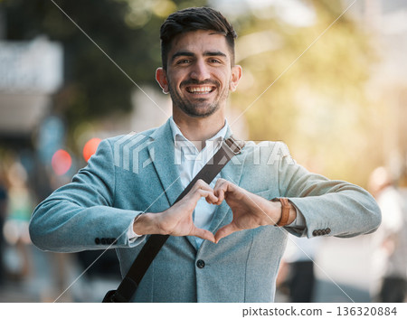 Hands in heart, business and portrait of man in city for support, startup goals and kindness in street. Travel, professional job and face of male worker with love emoji for career, working and job Hands in heart, business and portrait of man in city for support, startup goals and kindness in street. Travel, professional job and face of male worker with love emoji for career, working and job 136320884