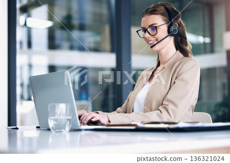 Call center, laptop and business woman, communication, customer support and typing, consulting and e commerce. Ecommerce, agency office and professional person in virtual consultation job on computer 136321024