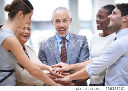 Portrait, business people and hands together for teamwork, cooperation and solidarity. Group, excited and community huddle of employees for support, mission or collaboration for goal in partnership. 136321281