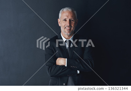 Arms crossed, happy and portrait of business man in studio for professional, corporate or manager. Boss, pride and confidence with face of male ceo on black background for executive and mockup space Arms crossed, happy and portrait of business man in studio for professional, corporate or manager. Boss, pride and confidence with face of male ceo on black background for executive and mockup space 136321344