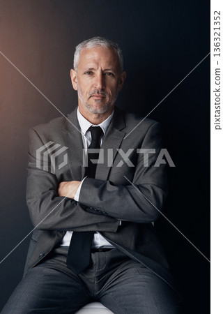 Portrait, chair and serious businessman with confidence, lawyer or attorney with on dark background in studio. Boss, ceo and professional business owner, senior director at law firm with arms crossed Portrait, chair and serious businessman with confidence, lawyer or attorney with on dark background in studio. Boss, ceo and professional business owner, senior director at law firm with arms crossed 136321352