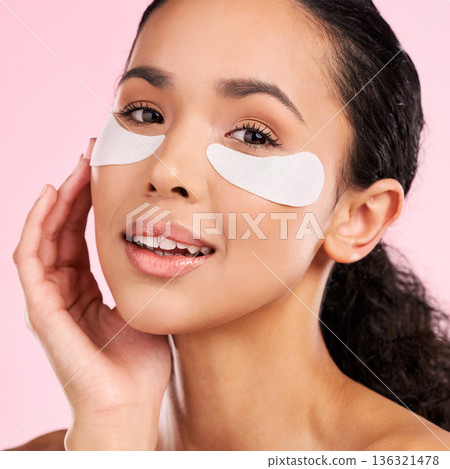 Eye patch, face mask and beauty of a woman with natural skin glow on a pink background. Dermatology, collagen and cosmetics portrait of female model for facial shine, wellness or self care in studio 136321478