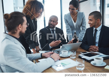 Computer, finance meeting and business people in discussion for financial review, planning and collaboration. Corporate office, teamwork and men and women working on report, project and proposal 136321500