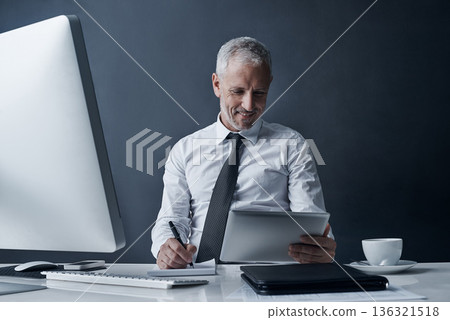 Tablet, ceo and senior man writing in studio isolated on a dark background mockup space. Technology, notes and happy manager at desk for working on audit project, reading email online or business app Tablet, ceo and senior man writing in studio isolated on a dark background mockup space. Technology, notes and happy manager at desk for working on audit project, reading email online or business app 136321518