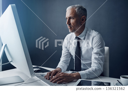 Computer, typing accountant and mature man in office, working and isolated on a studio background mockup. Tech, writing and serious manager at desktop for reading email, research or business auditor. Computer, typing accountant and mature man in office, working and isolated on a studio background mockup. Tech, writing and serious manager at desktop for reading email, research or business auditor. 136321562