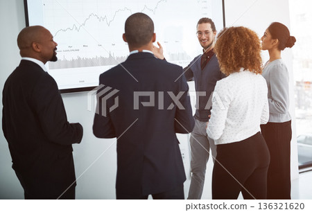 Business people, staff or man with presentation, graphs for profit growth or discussion for planning. Presenter, group or team with financial charts, investment or conversation for feedback or review Business people, staff or man with presentation, graphs for profit growth or discussion for planning. Presenter, group or team with financial charts, investment or conversation for feedback or review 136321620