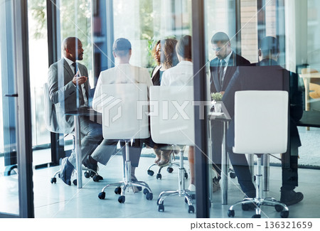 Teamwork, strategy and discussion for collaboration for management with success or idea. Professional, group and conversation with manager in meeting for solution or business report in boardroom. Teamwork, strategy and discussion for collaboration for management with success or idea. Professional, group and conversation with manager in meeting for solution or business report in boardroom. 136321659