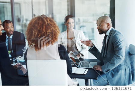 Business people, meeting and leader with corporate team, laptop and workshop with management group. Executive men, women and diversity with ceo, financial strategy and discussion for planning at desk Business people, meeting and leader with corporate team, laptop and workshop with management group. Executive men, women and diversity with ceo, financial strategy and discussion for planning at desk 136321671