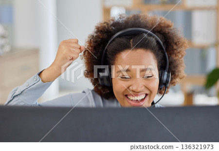 Fist, celebration and call center success for black woman in office consulting for crm, about us or customer service with good news. Telemarketing, sale and happy female consultant excited for target 136321973
