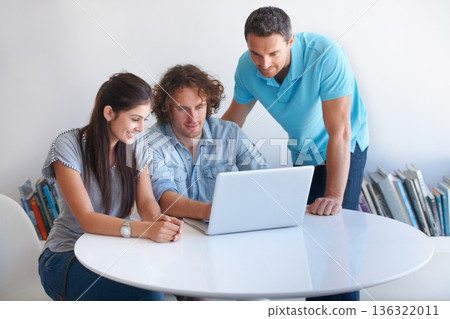 Laptop, teamwork and creative people in business startup, website design ideas and online solution. Collaboration, check and web designer team, woman and men talking, planning and review on computer 136322011