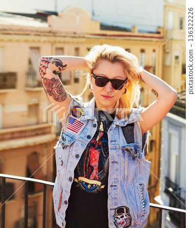 Tattoo, portrait and woman with sunglasses in city, urban body art or stylish fashion outdoor. Face, rooftop or trendy female person from Canada in cool denim clothes, jacket or serious punk attitude Tattoo, portrait and woman with sunglasses in city, urban body art or stylish fashion outdoor. Face, rooftop or trendy female person from Canada in cool denim clothes, jacket or serious punk attitude 136322226