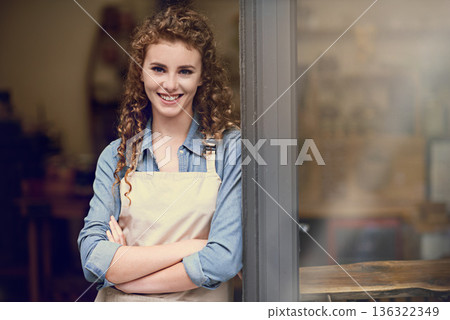 Smile, arms crossed and portrait of woman at restaurant for small business, coffee shop or waiter. Entrepreneur, happy and space with female barista at front door of cafe for diner in food industry 136322349