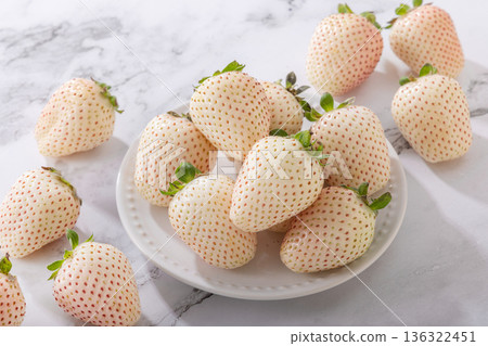 Fresh white strawberries 136322451