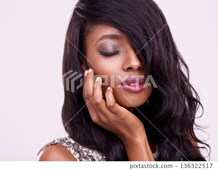 Beauty, skin and face of black woman in studio for makeup, hair extension or cosmetics. Headshot of an african female model on a pink background for facial shine, glow and luxury or glamour aesthetic Beauty, skin and face of black woman in studio for makeup, hair extension or cosmetics. Headshot of an african female model on a pink background for facial shine, glow and luxury or glamour aesthetic 136322517