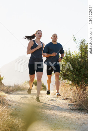 Morning, fitness and couple trail running as workout or morning exercise for health and wellness together. Sport, man and woman runner run with athlete as training in nature for sports or energy 136322634