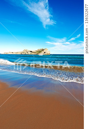 Ocean, waves with blue sky and landscape, beach and travel, sand and summer vacation outdoor in Hawaii. Environment, horizon and seaside location, tropical destination and journey with mockup space 136322677