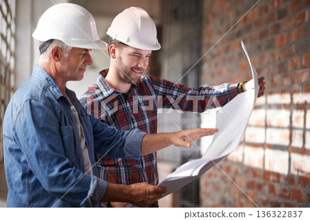 Architect team, blueprint and engineer reading for planning, analysis or real estate development. Men, paperwork and property design at construction site, building or helmet for consulting for vision Architect team, blueprint and engineer reading for planning, analysis or real estate development. Men, paperwork and property design at construction site, building or helmet for consulting for vision 136322837