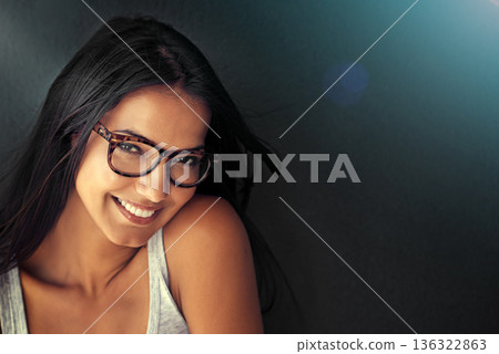 Woman, face and happy with glasses and vision with designer frame with prescription lens on studio background. Portrait, eye care and female model with fashion eyewear, optometry and mockup space 136322863
