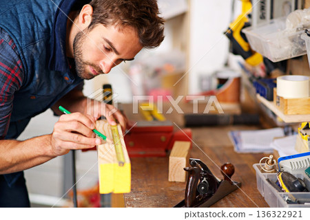 Man, focus wood and tape measure for construction, home development and building renovation. Carpenter, maintenance employee and male repairman worker on a contractor job of builder working in house Man, focus wood and tape measure for construction, home development and building renovation. Carpenter, maintenance employee and male repairman worker on a contractor job of builder working in house 136322921