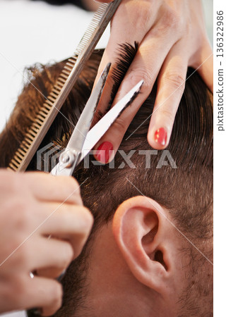 Hair scissors, customer and hairdresser hands cutting hairstyle, grooming and cleaning in studio salon. Hairdressing tools, comb brush or closeup people, customer or client for haircare treatment 136322986