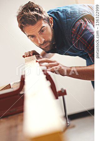 Carpenter, wood and design with man in workshop for building, manufacturing and creative. Planning, industry and woodworker with handyman measuring on workbench for builder, lumber and maintenance Carpenter, wood and design with man in workshop for building, manufacturing and creative. Planning, industry and woodworker with handyman measuring on workbench for builder, lumber and maintenance 136322999