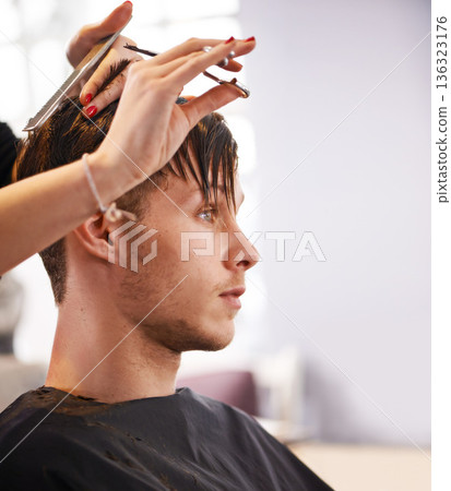 Hair scissors, person and hairstylist cutting healthy hairstyle, grooming and cleaning in studio salon. Hairdressing tools, wellness or profile client, stylist or hairdresser doing texture treatment 136323176