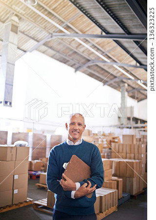 Manager, smile and portrait of man in warehouse for cargo, storage and shipping. Distribution, ecommerce and logistics with employee in factory plant for supply chain, package or wholesale supplier 136323225