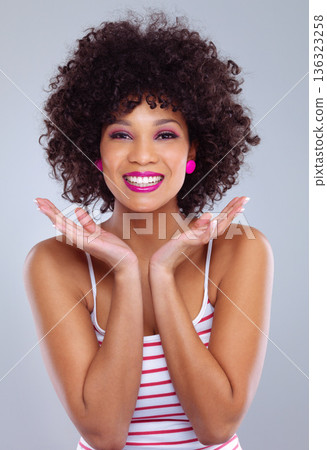 Beauty, face and black woman in studio for makeup, cosmetics or happiness for fashion. Young female, portrait of model smiling with pink lipstick, eyeshadow and confidence in natural curly hair style Beauty, face and black woman in studio for makeup, cosmetics or happiness for fashion. Young female, portrait of model smiling with pink lipstick, eyeshadow and confidence in natural curly hair style 136323258