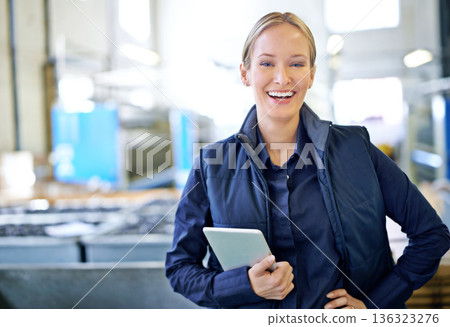 Tablet, happy and portrait of woman in factory for manufacturing, networking and inventory. Distribution, industrial and technology with female employee in warehouse for inspection, export or storage 136323276