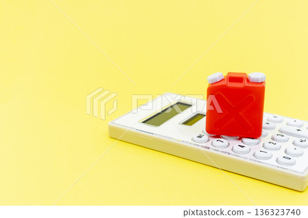 Kerosene can and calculator - Image of kerosene prices and heating costs 136323740