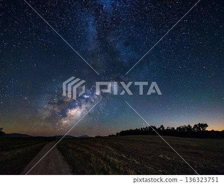 A night landscape of galaxies and starry skies that gives a sense of space A night landscape of galaxies and starry skies that gives a sense of space 136323751