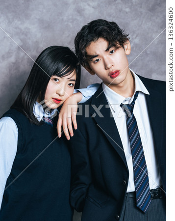 Portrait of male and female students in uniform Portrait of male and female students in uniform 136324600